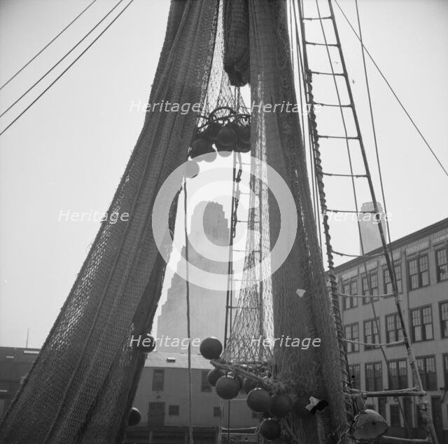 An early morning scene at the Fulton fish market, New York, 1943. Creator: Gordon Parks.