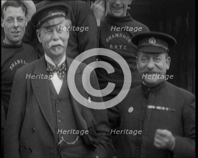 Sir Thomas Lipton Standing With the Crew of the Ship 'The Shamrock', 1920. Creator: British Pathe Ltd.