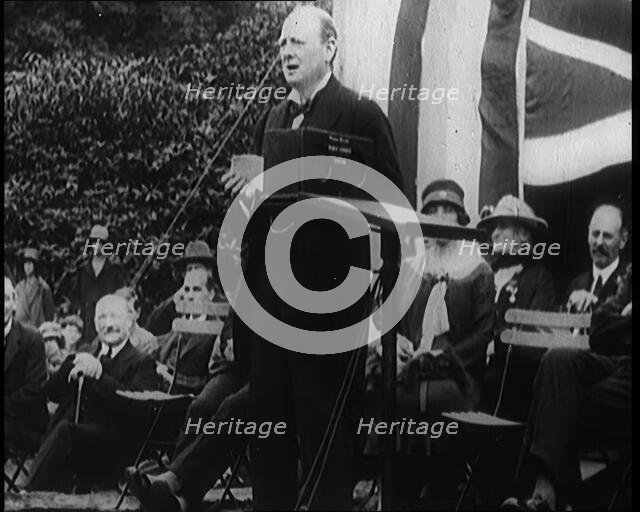 Winston Churchill Making a Speech from a Platform Infront of a Small Crowd, 1924. Creator: British Pathe Ltd.