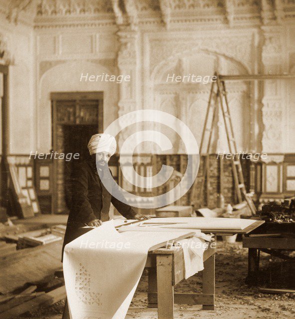 Bhai Ram Singh at work in the Indian Room, Osborne House, Isle of Wight, 1892. Artist: Unknown.