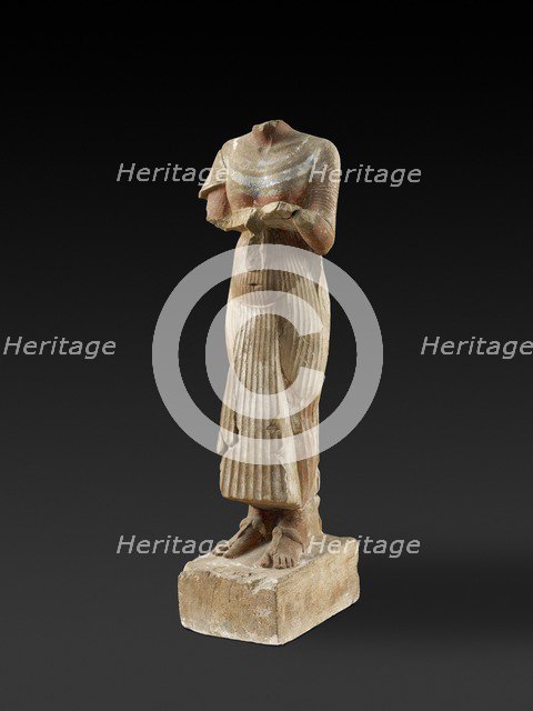 Figure of Pharaoh Akhenaten holding an offering table, XVIIIth Dynasty, c1540-c1292BC. Artist: Unknown.