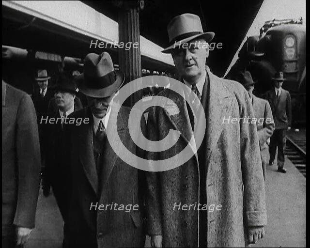 Henry Ford and His Entourage Walking Towards the Camera, 1930s. Creator: British Pathe Ltd.