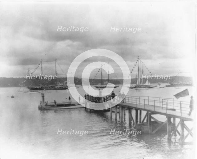 New York - Oyster Bay, Long Island Yacht Club: looking past pier to sailing yachts at anchor, 1905. Creator: Unknown.