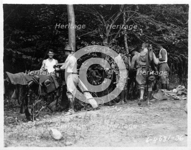 Field Artillery cadets cleaning harnesses on a training hike, Fort Sheridan, Illinois, USA, 1920. Artist: Unknown