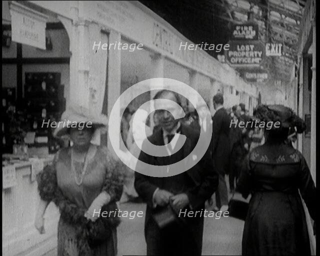 William Aitken, 1st Baron Beaverbrook, and His Wife, Gladys, Walking Together at the...London, 1922. Creator: British Pathe Ltd.