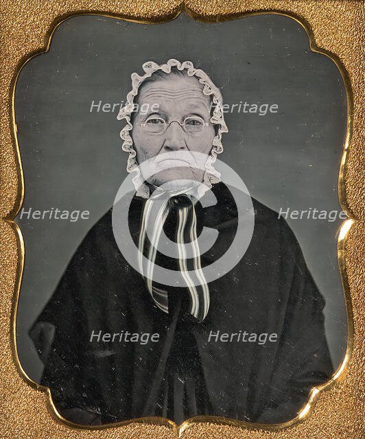 Elderly Woman Wearing Glasses and a Soft Bonnet, 1850s. Creator: Unknown.