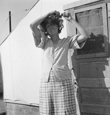 In a carrot pullers' camp near Holtville, Imperial Valley, California, 1939. Creator: Dorothea Lange.
