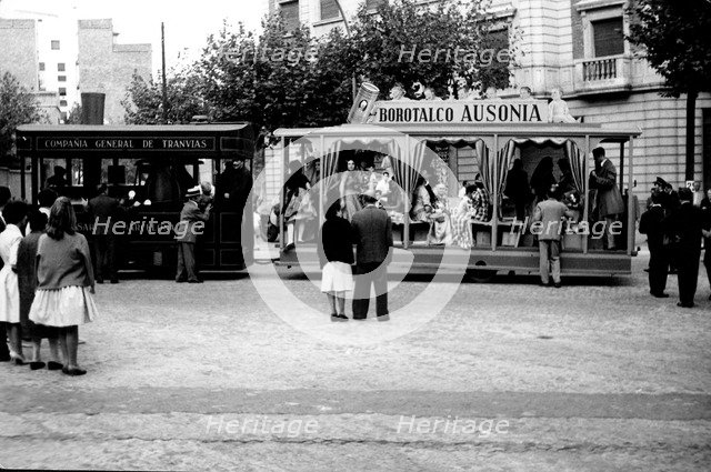 Exhibition of old trams with people in costume in the city center, photo about 1960.