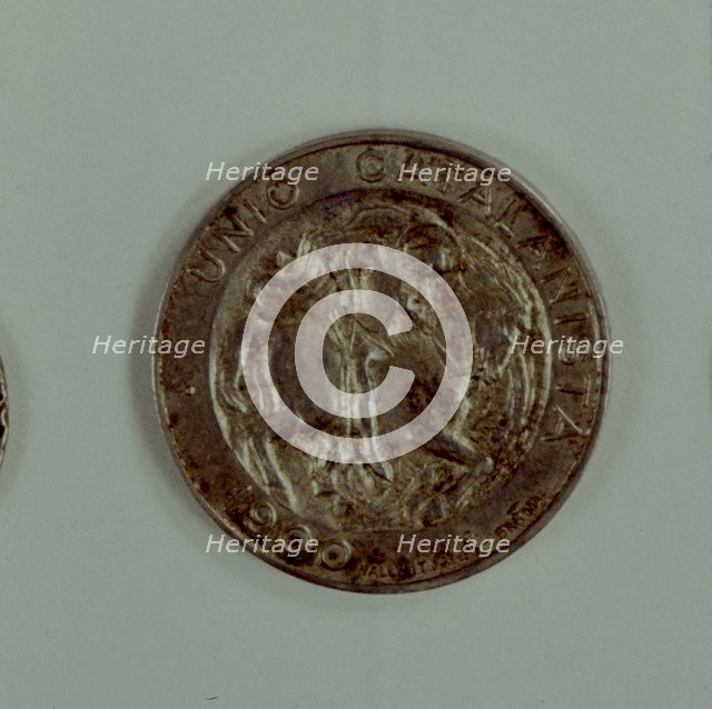 Head of a one-peseta coin in silver used as a medal of the Catalanist Union, work of the engravin…