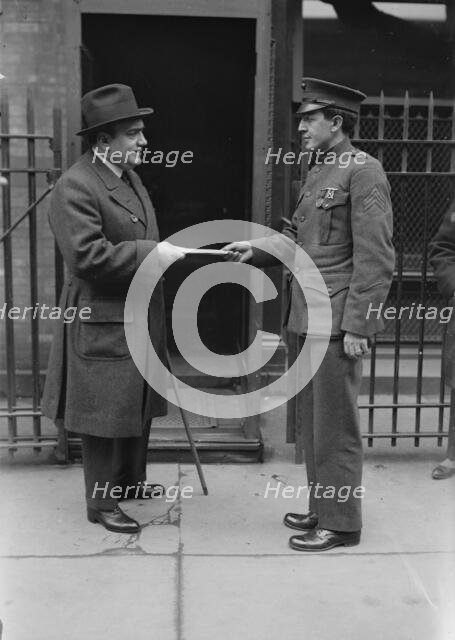 Caruso greets a marine, between c1915 and c1920. Creator: Bain News Service.
