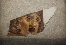 Fragment with tragic theatrical mask, 1st century. Creator: Roman-Pompeian wall painting.