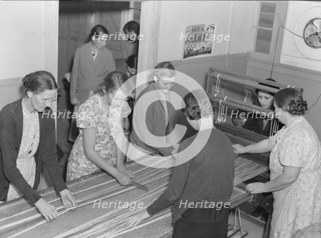 In the sewing room, Shafter camp for migrants (FSA), California, 1938. Creator: Dorothea Lange.