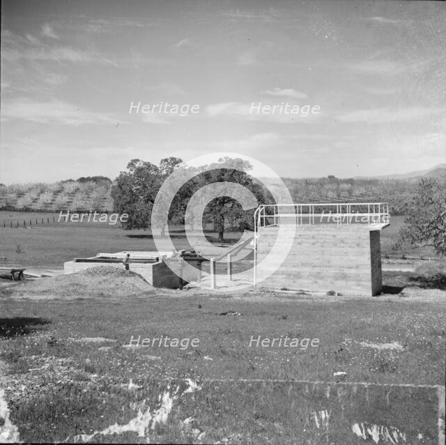 Sewage disposal plant at the Aqua Fria Farm security administration camp, Maricopa County, AZ., 1940 Creator: Dorothea Lange.