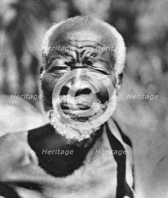 The story teller, Livingstone to Broken Hill, Northern Rhodesia, 1925 (1927).  Artist: Thomas A Glover