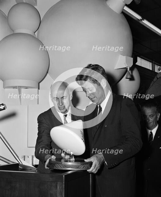 Gilruth presents President Kennedy with a model of the Apollo spacecraft, 1960s. Creator: Unknown.