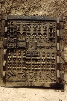 Carved wooden door, Pays Dogon, Mali, 1990. Creator: Amanda Waite.