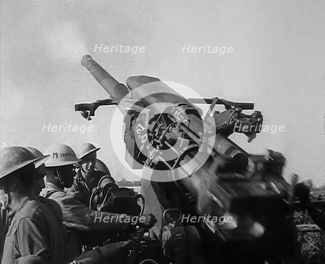 British Soldiers Firing Artillery, 1944. Creator: British Pathe Ltd.