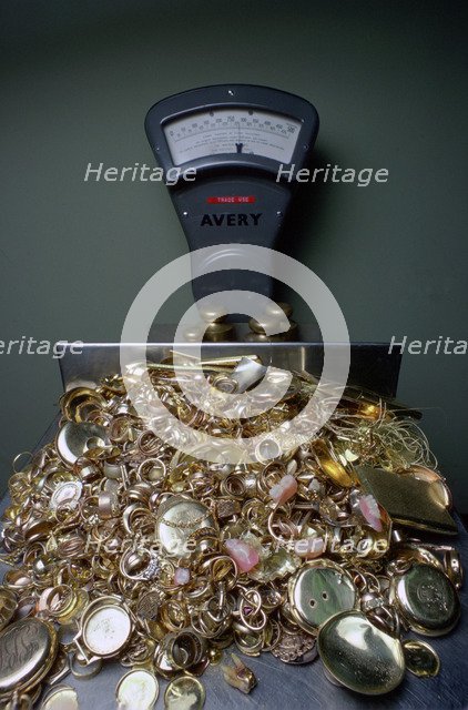Weighing gold scrap, Hatton Garden, London.  Artist: Tony Evans