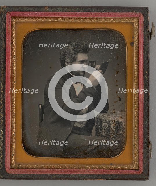 Untitled (Portrait of Man Looking Through a Stereoscope), 1856. Creator: Unknown.
