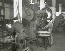 Production line of a company who manufacture motorcycle components, Barcelona, Spain, 1945.  Creator: Unknown.