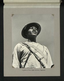 A gunner of the Sudan Artillery Regiment, 1964. Creators: Colonial Office, Unknown.