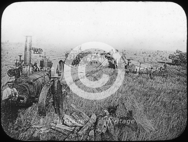 Harvest scene on the North American prairies, late 19th or early 20th century. Artist: George Philip & Son Ltd