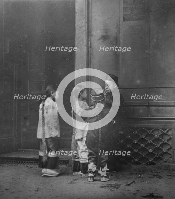 His first cigar, Chinatown, San Francisco, between 1896 and 1906. Creator: Arnold Genthe.