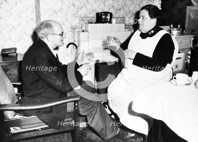 Salvation Army Major at the Deaf & Dumb club, Bethnal Green, London, c1920s. Artist: Unknown
