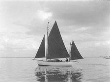 The 4 ton yawl 'Mandy' under sail, 1922. Creator: Kirk & Sons of Cowes.