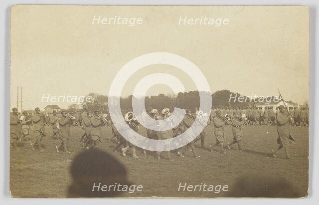 Photographic postcard of a military marching band, ca. 1917. Creator: Unknown.