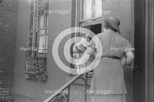A tenant, 61st Street between 1st and 3rd Avenues, New York, 1938. Creator: Walker Evans.