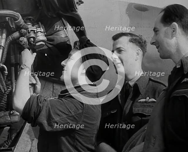 People Inspecting Part of an Aeroplane, 1942. Creator: British Pathe Ltd.