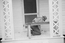 Possibly: Briar Patch Project, Carpenter at work, Eatonton, Georgia, 1936. Creator: Walker Evans.