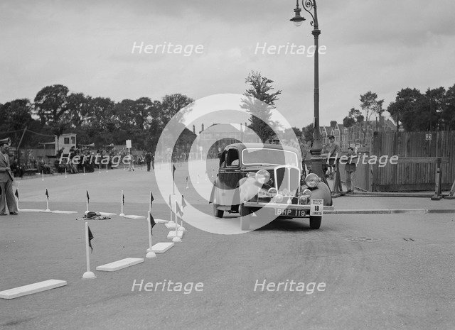 Standard saloon of Mrs SH Richards competing in the South Wales Auto Club Welsh Rally, 1937 Artist: Bill Brunell.