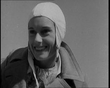 Jean Batten in Flying Gear Smiling to Crowds, 1930s. Creator: British Pathe Ltd.