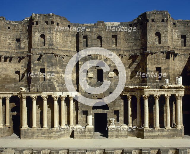 Scaenae frons, porticus post scaenam and pulpitum, Roman Theatre, Bosra, Syria, 2001. Creator: LTL.
