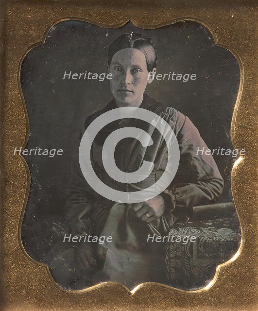 Young Woman Seated Next to a Table with Elbow Resting on a Book, 1840s. Creator: Unknown.