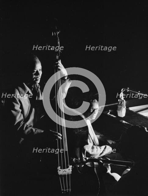 Portrait of Wesley Prince, Nat King Cole, and Freddie Moore, New York, N.Y., ca. July 1946. Creator: William Paul Gottlieb.