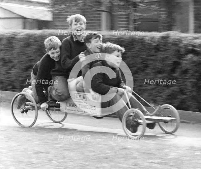 Boys playing with a home-made go-kart, Horley, Surrey, 1965.