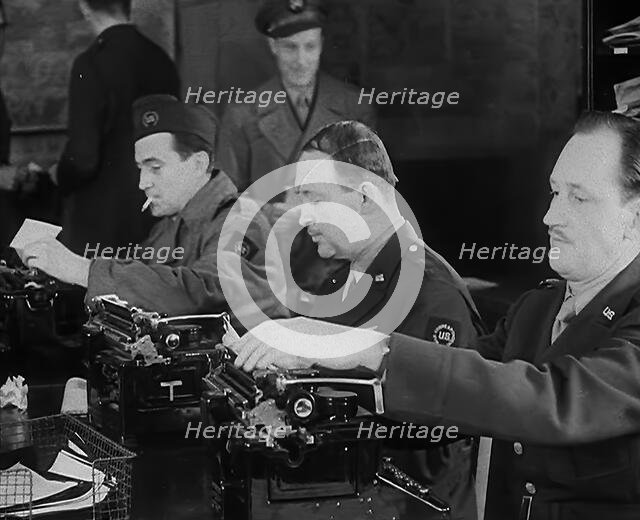 Uniformed Journalists Working, 1943. Creator: British Pathe Ltd.