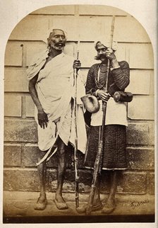 Oude, India: two men holding long sticks, c1860. Creator: Unknown.