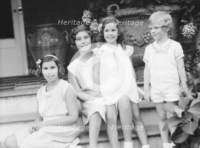 Children of W.G. Kimball, seated on the steps of their house, between 1911 and 1942. Creator: Arnold Genthe.