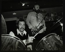 Alan Jackson (drums) and Don Weller (saxophone) playing at The Bell, Codicote, Hertfordshire, 1980. Artist: Denis Williams