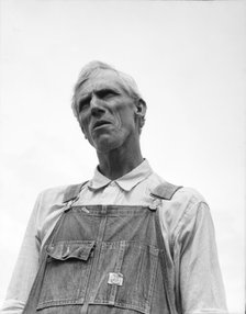 An evicted Arkansas sharecropper now settled at Hill House, Mississippi, 1936. Creator: Dorothea Lange.