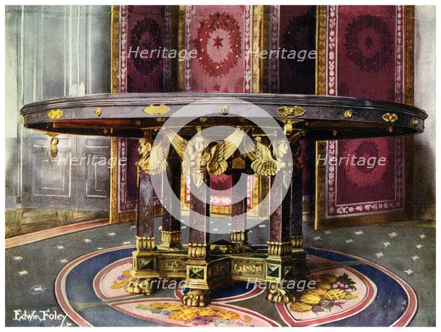 Circular table and folding screen, 1911-1912.Artist: Edwin Foley