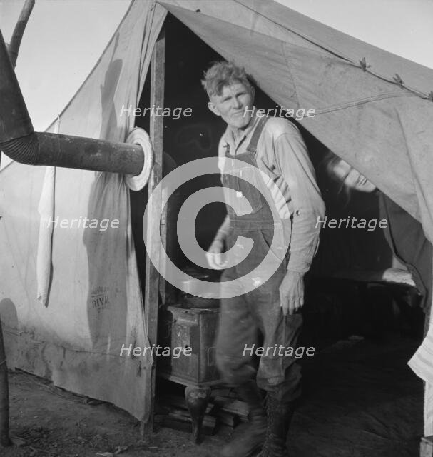 Supper time in FSA migratory emergency camp...the pea fields, Calipatria, CA, 1939. Creator: Dorothea Lange.