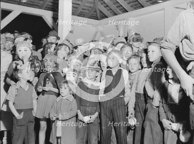 Halloween party at Shafter migrant camp, California, 1938. Creator: Dorothea Lange.