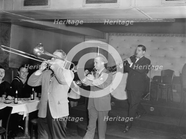 Portrait of George Brunis and Tony Parenti, Jimmy Ryan's (Club), New York, N.Y., ca. Aug. 1946. Creator: William Paul Gottlieb.