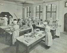 Cookery class, Hammersmith Trade School for Girls, London, 1915.  Artist: Unknown.