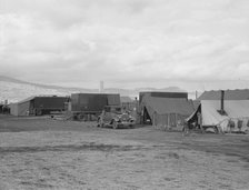 Shows pickers' tents, power unit and shower bath..., FSA camp, Merrill, Klamath County, Oregon, 1939 Creator: Dorothea Lange.